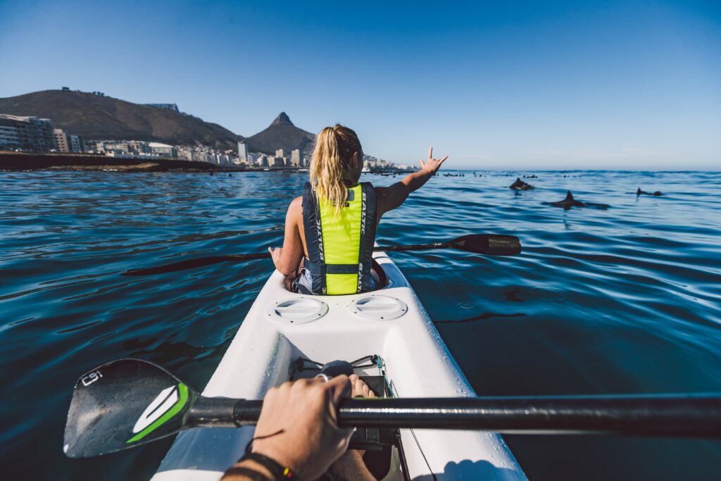 Travellers kayaking along Cape Town's coast